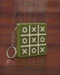 Tic Tac Toe Keychain in Matt Olive Green with Matt Off-white X, O and grid lines, keyring attached through the side edge